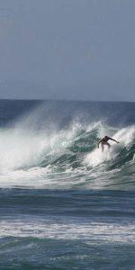 Man surfing at Puerto Rico beach.