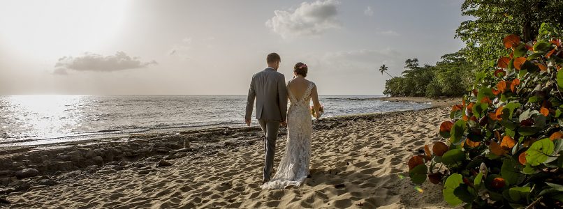 Wedding couple walking hand in hand on Maria's Beach PR