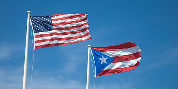 United States flag and the territory of Puerto Rico flag.