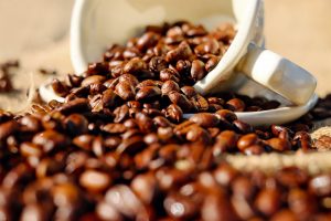 Coffee beans in coffee cup.