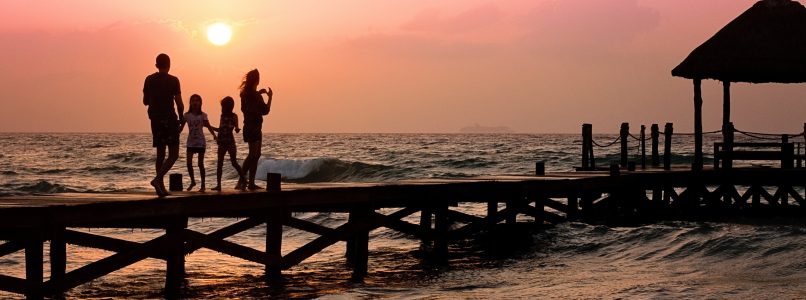 Family on a pier in Rincon, Puerto Rico