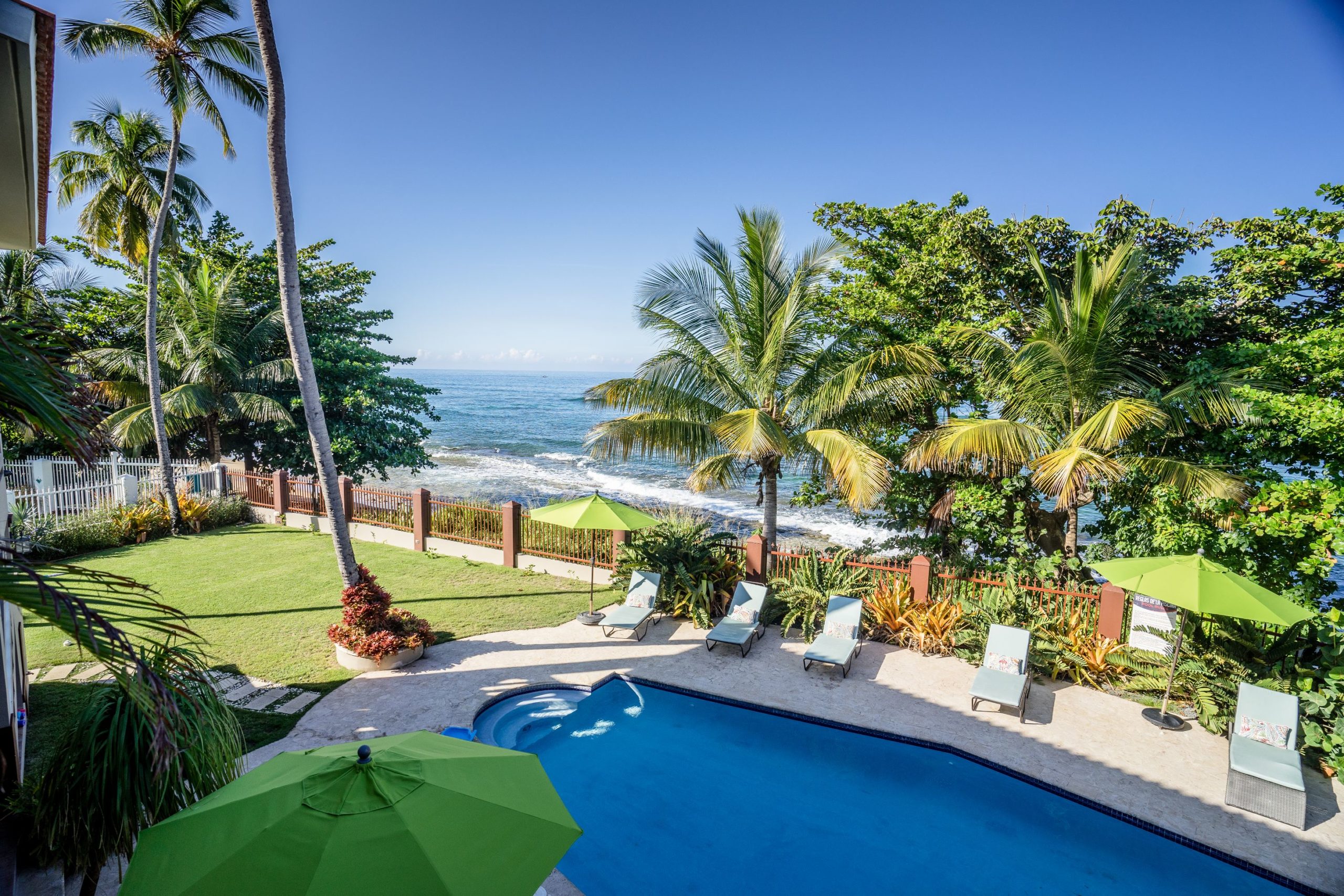 View of swimming pool and ocean from Maria's Villa in Puerto Rico