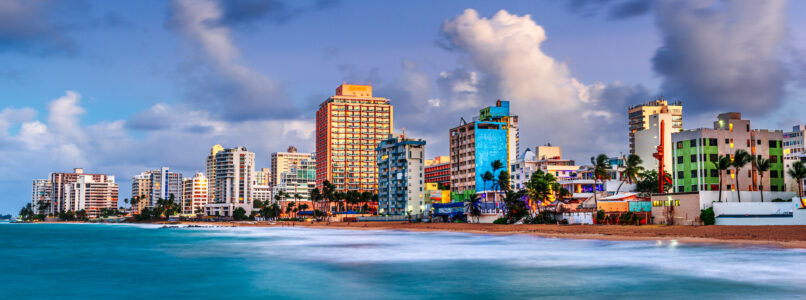 Puerto Rico resort skyline on Beach at dusk.