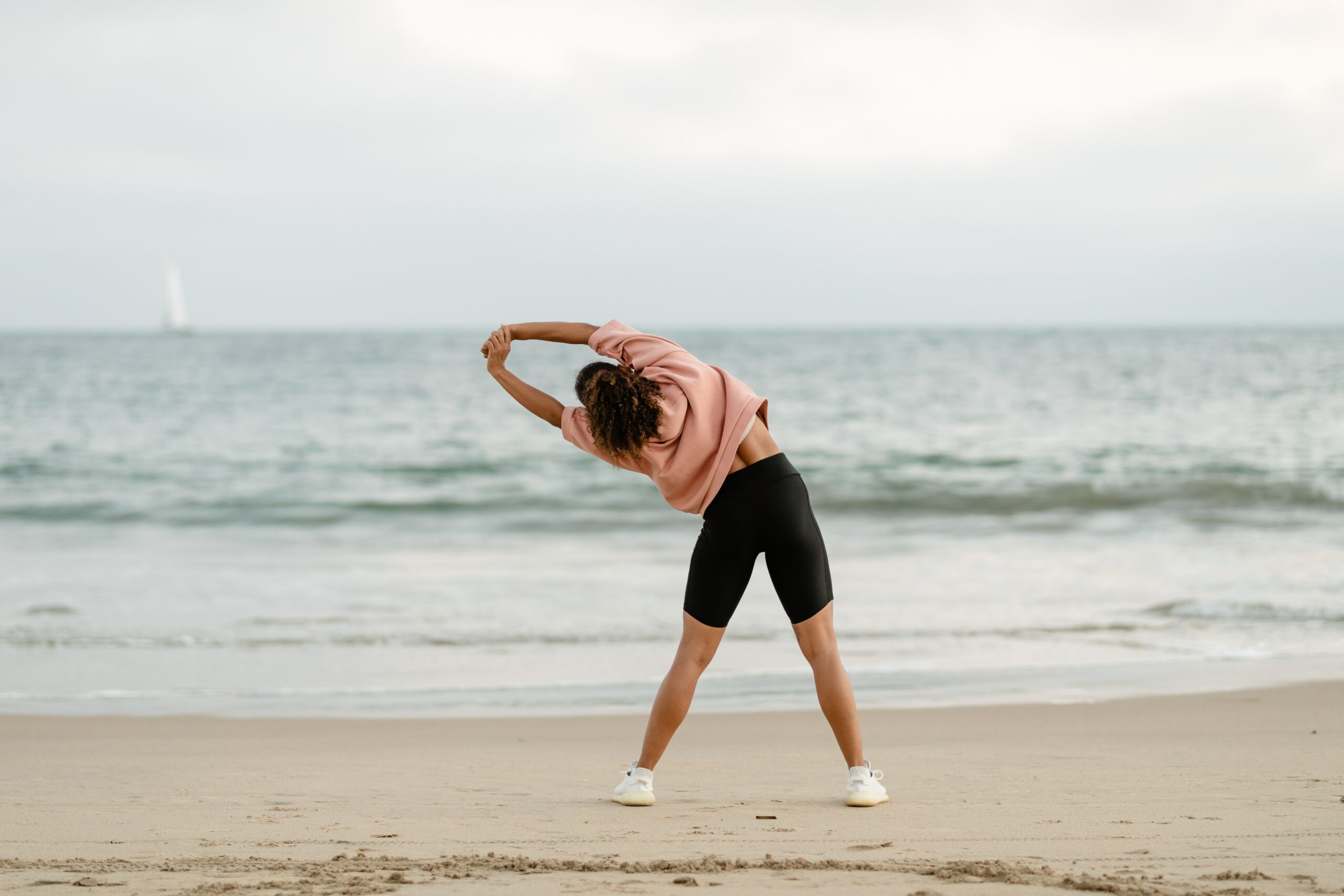 Woman Stretching on the beach