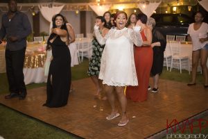People dancing at a wedding reception at Maria's Villa Rincon, PR