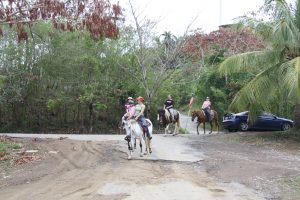 Family on horseback in Puerto Rico