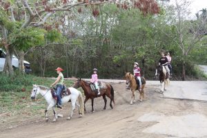 Family on horseback in Puerto Rico
