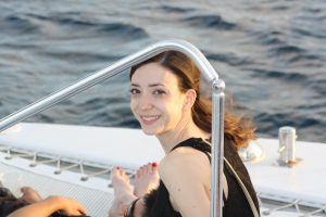 Smiling woman on a boat
