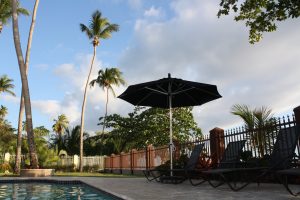 Umbrella poolside at Maria's Villa PR
