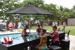 Villa Guests enjoying poolside food at Maria's villa PR