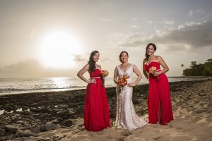Bride and bridesmaids posing for a picture on Maria's Beach PR