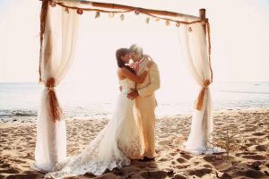 Wedding couple posing on beach at Maria's Villa PR