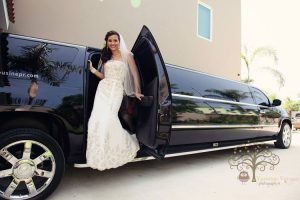 Bride stepping out of a stretch limo